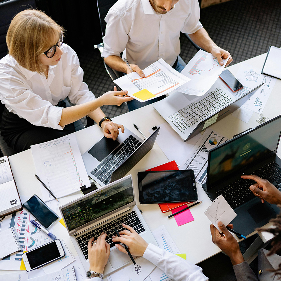 Researchers discussing scientific data